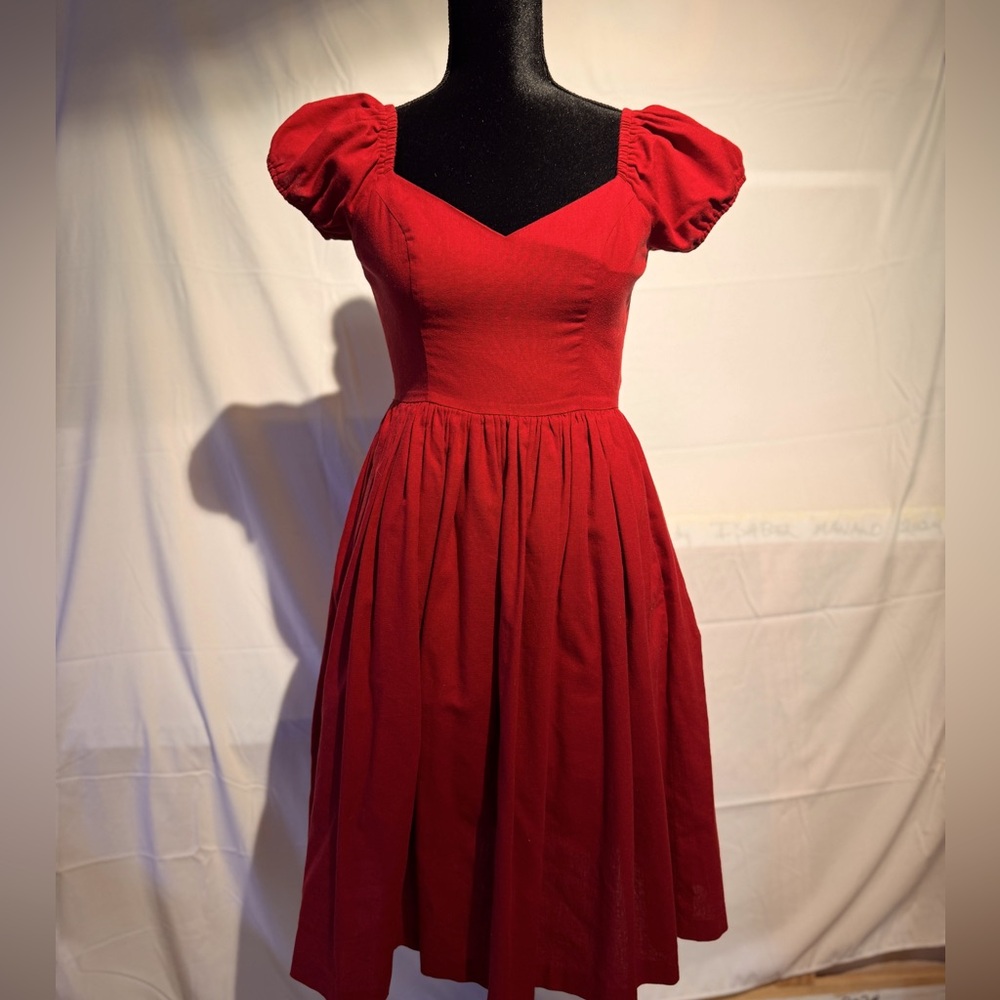 Red cap sleeve dress in cotton by Hearts and Found Sz XS. Fitted at waist.
